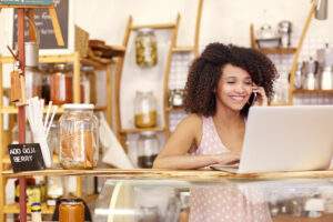 Young woman working at a small business in Flint, MI